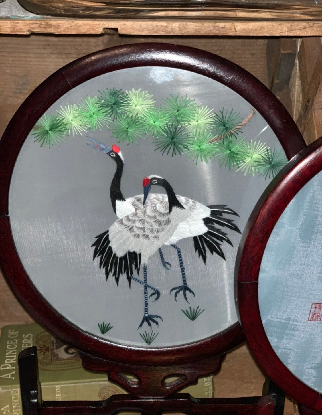 Double sided embroidered silk screens on ornate carved wood stands - priced individually