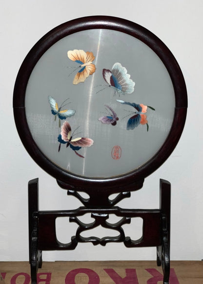 Double sided embroidered silk screens on ornate carved wood stands - priced individually