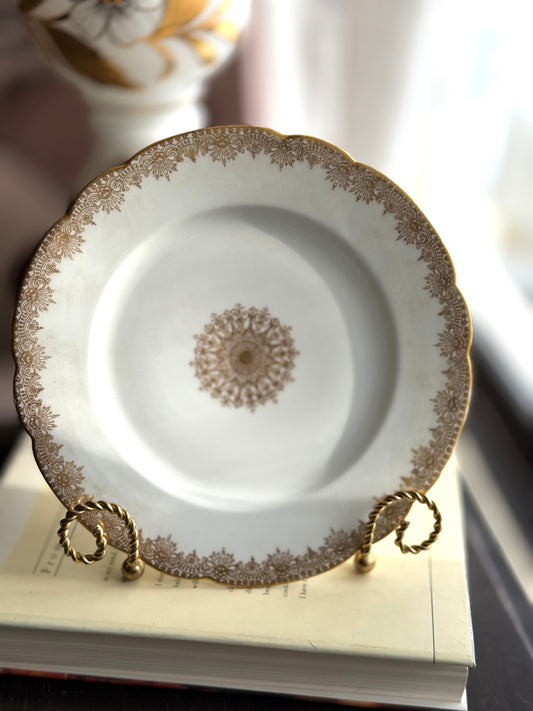 Limoges plates Gold trim & center emblem 8 available 5 great, 3 chips