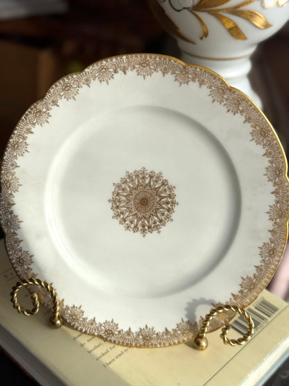 Limoges plates Gold trim & center emblem 8 available 5 great, 3 chips