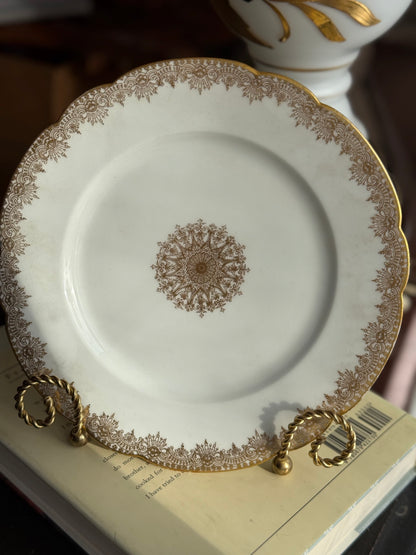 Limoges plates Gold trim & center emblem 8 available 5 great, 3 chips