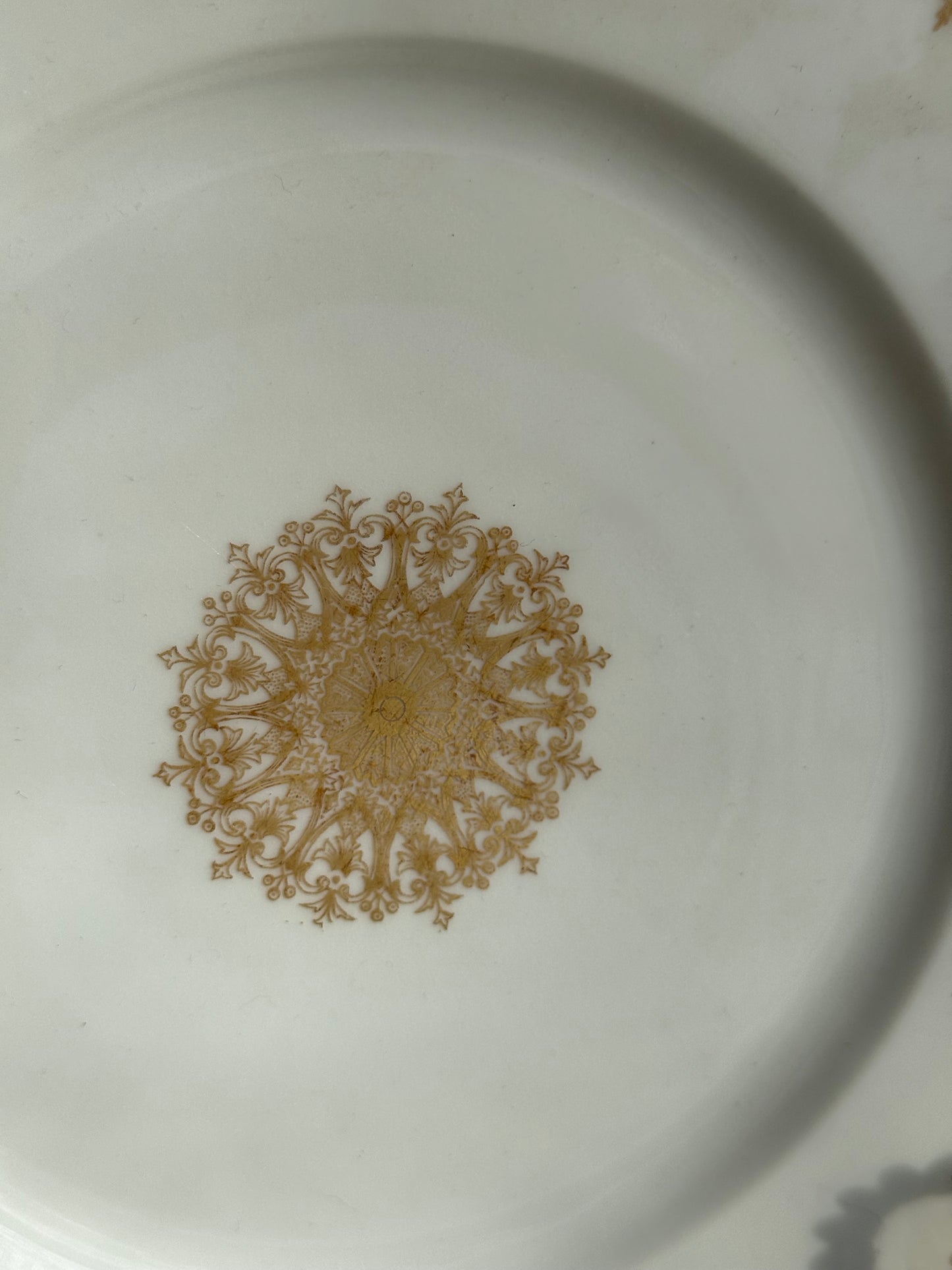 Limoges plates Gold trim & center emblem 8 available 5 great, 3 chips