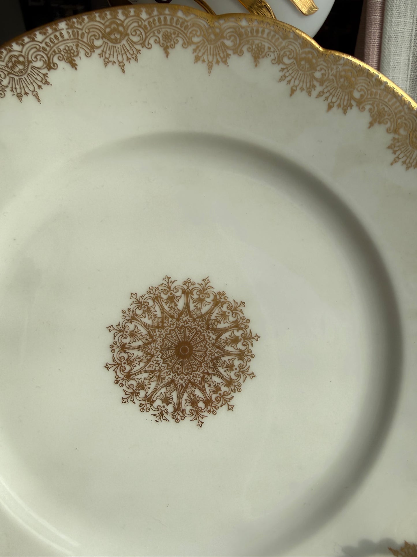 Limoges plates Gold trim & center emblem 8 available 5 great, 3 chips