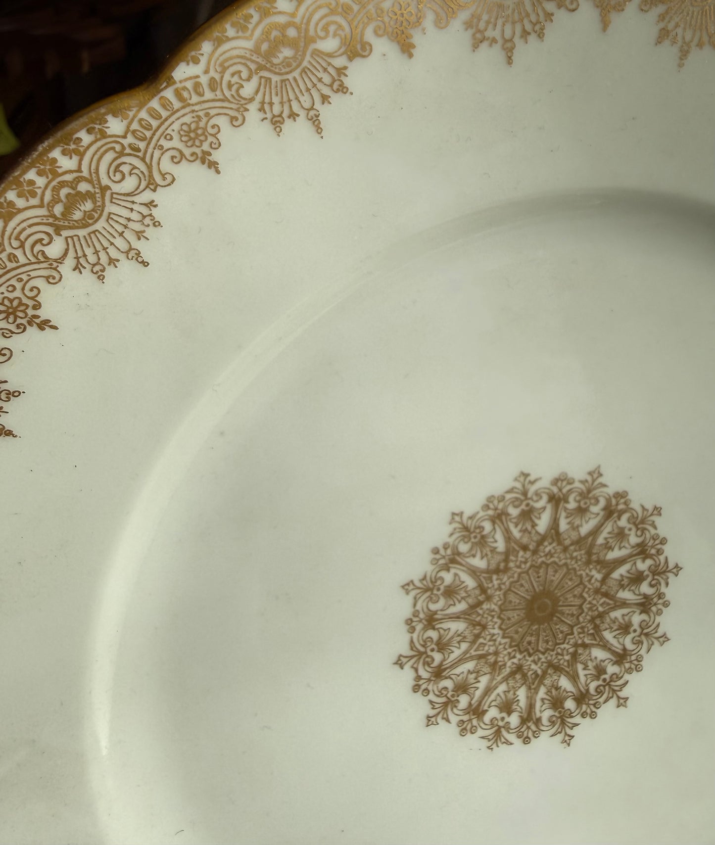Limoges plates Gold trim & center emblem 8 available 5 great, 3 chips